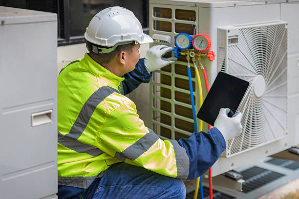 Professional Heat Pump Repair technician working in Denton, MD